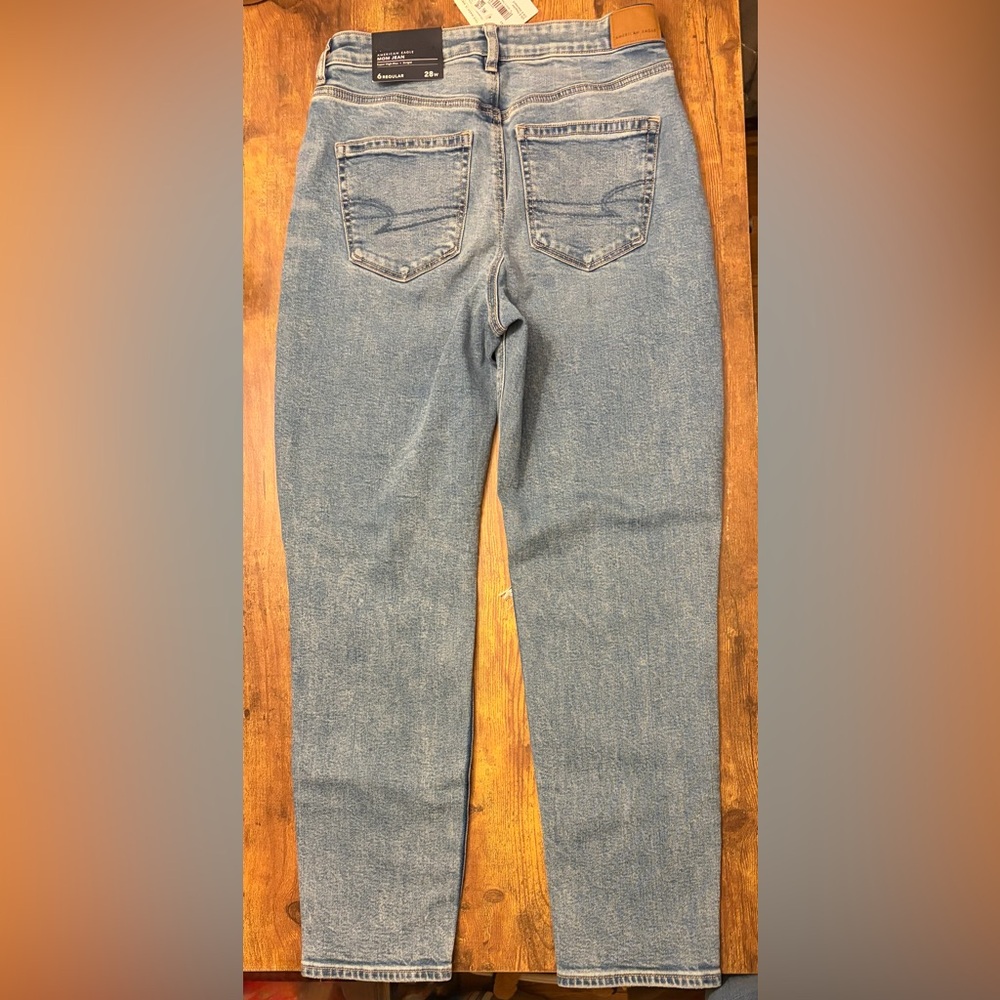 NWT American Eagle Strigid Ripped Mom Jeans in color-blown-out blue shade. - Picture 7 of 8